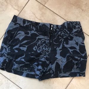 Dark and light blue shorts.